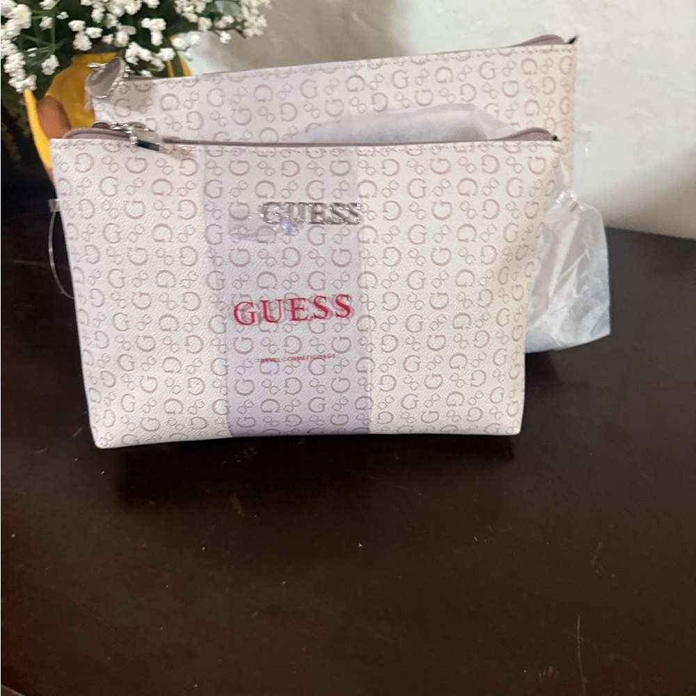 GUESS White and Light Gray Cosmetic Pouch with Red Logo